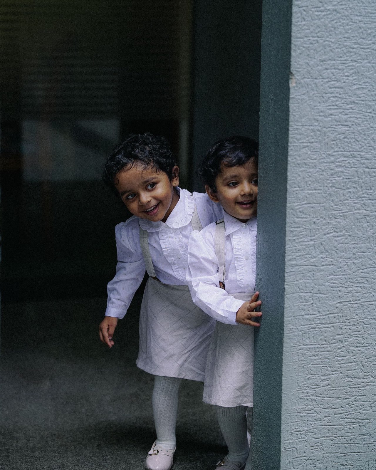 Two young children playing together, building social skills