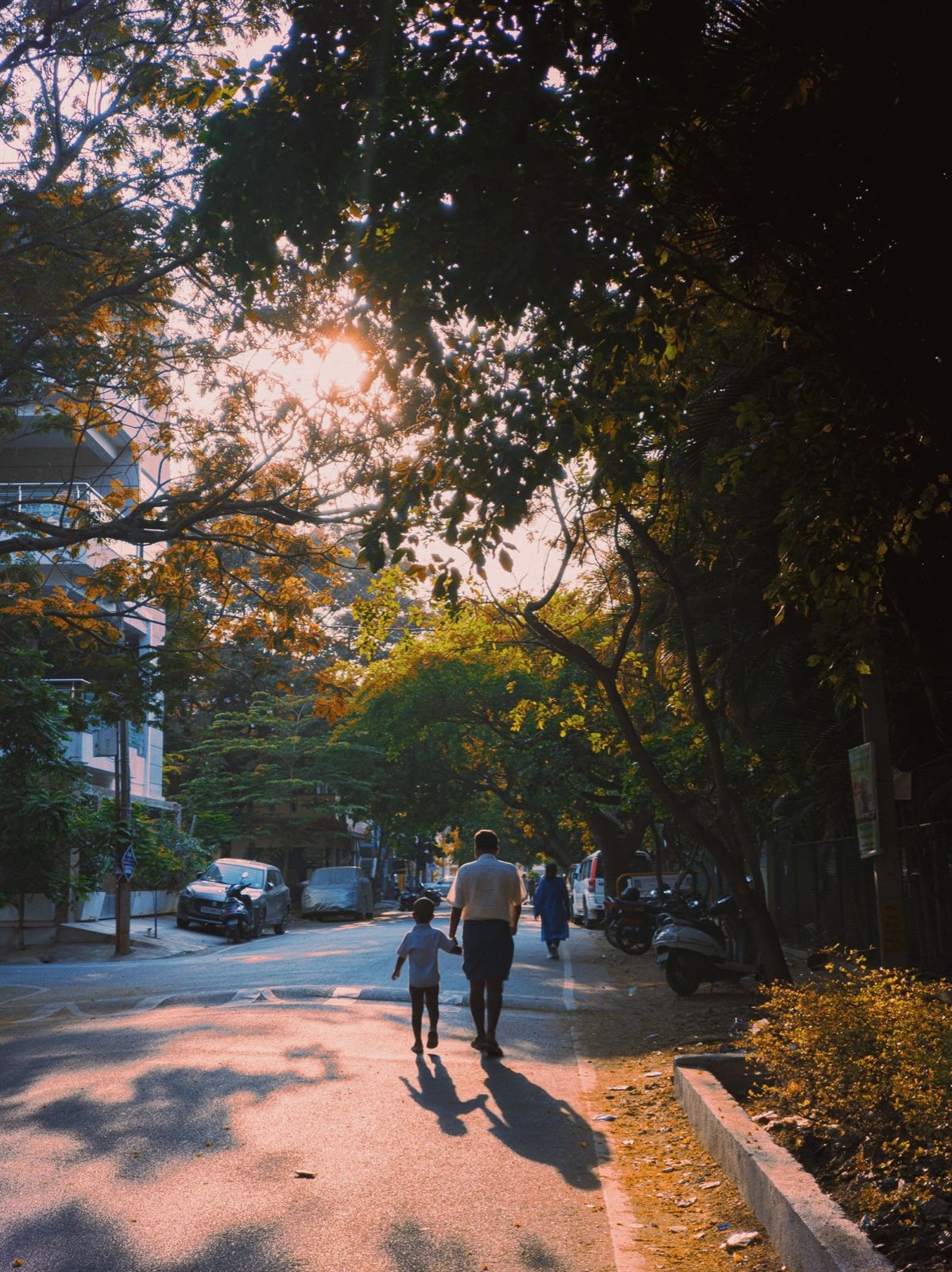 A parent and child walking together, taking the first step in their journey