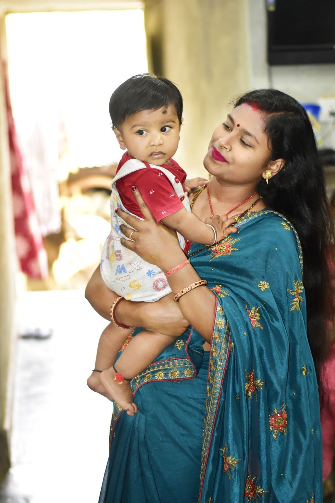 Parent and child in a close, face-to-face moment
