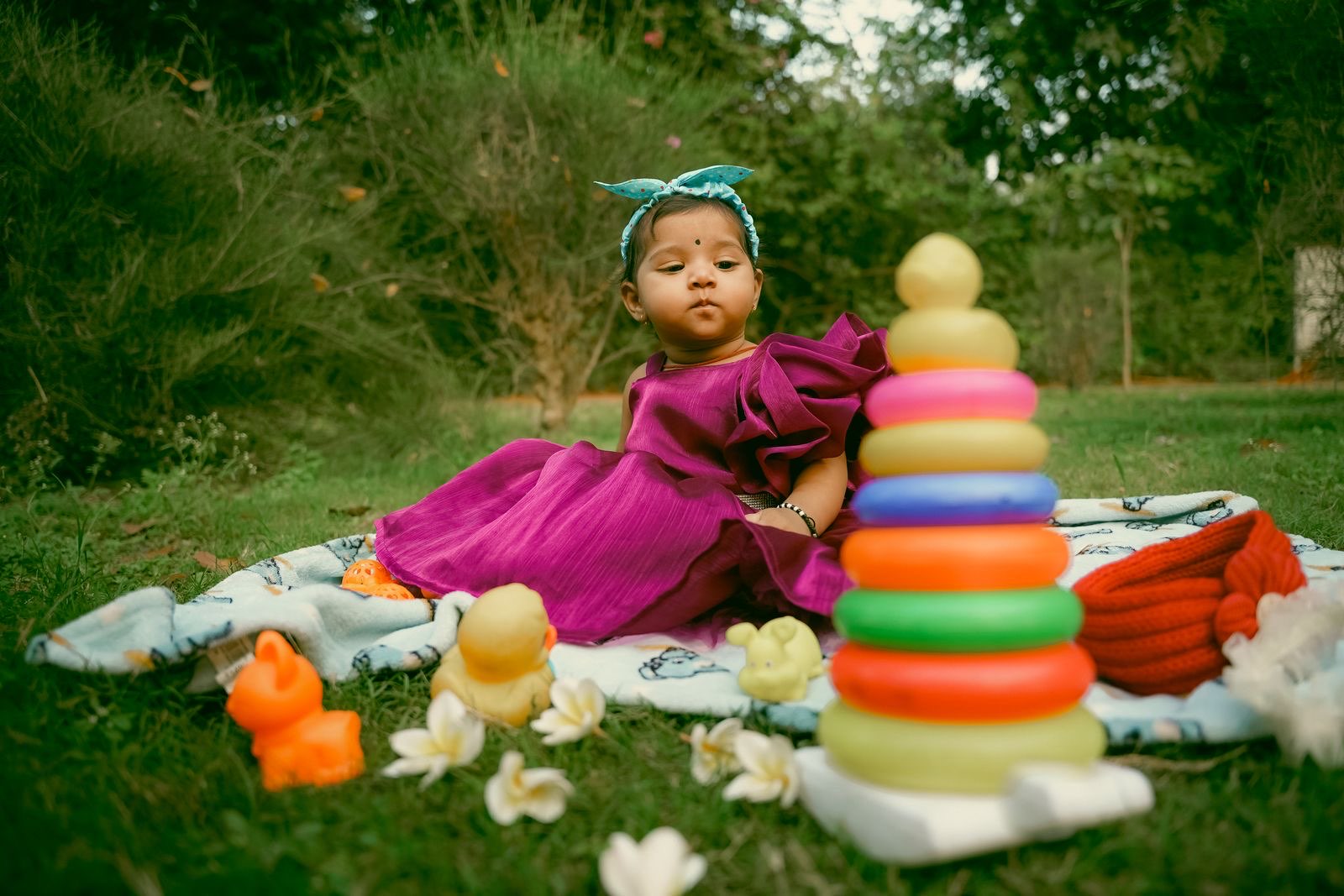 Toddler engaging with a colourful developmental toy